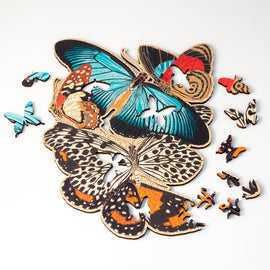 Jigsaw puzzle featuring colorful butterflies, showing special whimsy pieces