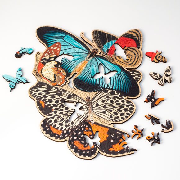Jigsaw puzzle featuring colorful butterflies, showing special whimsy pieces