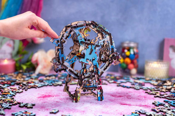Assembled carnival puzzle in the shape of a ferris wheel (3D)