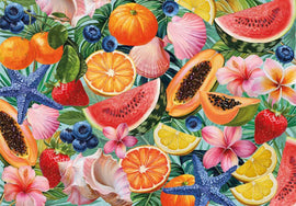 Colorful tropical fruits and flowers on a green leafy background
