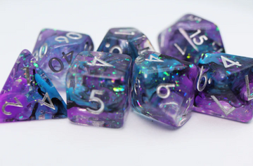 A vibrant set of eight RPG dice in various shapes, featuring a blend of purple and blue colors with glittering sparkles. Each die has clear, legible numbers, perfect for tabletop gaming.