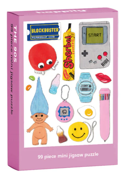 99 Piece Mini Jigsaw Puzzle featuring a fun illustration of 90’s nostalgia by Holly Maguire. The perfect gift for children of the 90s and retro lovers. 

Suitable for ages 12+

Puzzle size: 10cm x 14cm

Made in China using sustainably sourced high quality paper and 100% recycled board. Zero plastic used.