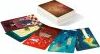 Dixit: Quest board game by Asmodee, featuring a beautifully illustrated box and an array of colorful cards laid out beside it. The cards showcase vibrant artwork that encourages creativity and storytelling, making it perfect for family game nights.