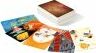Dixit: Odyssey board game by Asmodee featuring a colorful array of illustrated cards displayed beside the beautifully designed game box. The cards showcase imaginative artwork, inviting players into a world of storytelling and creativity.