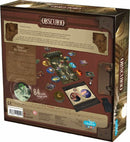 The back of the board game Obscurio by Libellud, showcasing the game's components including 84 round image cards, a game board, and detailed instructions. The design features a rich color palette and whimsical illustrations, inviting players to uncover mysteries within the game.