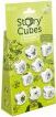 Rory's Story Cubes Voyages game by Zygomatic featuring a vibrant green packaging. The package contains nine illustrated dice designed for storytelling, allowing players to create unique narratives.