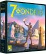 The box for the game '7 Wonders' made by Repos. The cover features a vibrant illustration of a statue holding a torch against a backdrop of ancient architecture and colorful skies. The title '7 Wonders' is prominently displayed at the top in bold, yellow letters.
