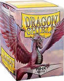 Dragon Shields: (100) Matte Pink card sleeves. The packaging features a vibrant design with a majestic pink dragon spreading its wings against a cloudy background, showcasing the 'Dragon Shield' logo prominently at the top.