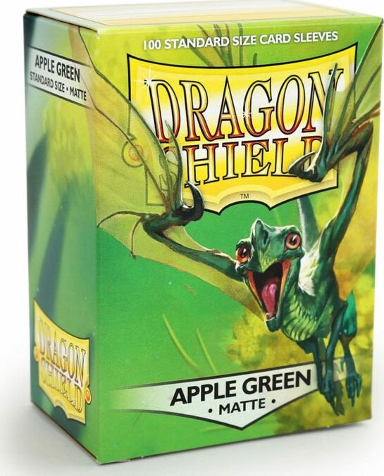 Dragon Shields card sleeves in Apple Green color. The box contains 100 standard size, matte finish card sleeves adorned with a vibrant, illustrated dragon design. Ideal for protecting trading cards and gaming accessories.