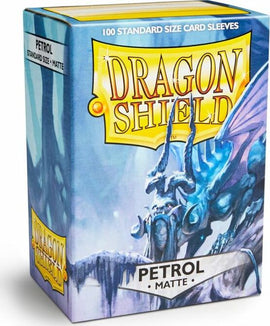 A product box of Dragon Shields featuring 100 standard size matte card sleeves in a petrol color. The design showcases a dragon theme with icy blue hues, ideal for protecting gaming cards.