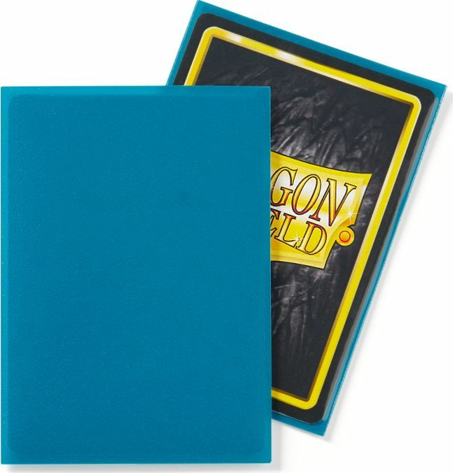 A pack of 100 Dragon Shields in Matte Petrol color, designed for card protection. The package shows a glossy back cover with the Dragon Shield logo and a vibrant teal front cover, ideal for gaming enthusiasts.