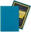 A pack of Dragon Shields gaming card sleeves in Matte Petrol color. The package features a bold logo of Dragon Shields on a black background, with a vibrant teal sleeve in the foreground, designed to protect gaming cards from wear and tear, ensuring longevity and style.