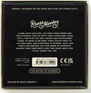 Overrated/Underrated Social Game by Brass Monkey, featuring a box design that describes a fun party game where players guess how well they know their friends' tastes. The game includes over 300 items to debate about, ranging from food to pop culture, and promotes lively discussions among players.