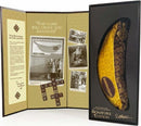Bananagrams Signature Edition game package showing the iconic yellow banana-shaped pouch inside a beautifully designed box. The inside includes nostalgic black-and-white photographs and playful text emphasizing the fun and engaging nature of the game. The box features the game title and its signature elements.