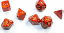 A collection of seven mini RPG dice in a striking scarlet color with gold numbering. The set includes various shapes of dice commonly used in role-playing games, showcasing intricate detailing and a glossy finish that enhances their vibrant hue. Perfect for tabletop gaming enthusiasts who appreciate unique and eye-catching dice.
