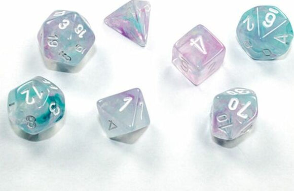 Set of Mini Nebula RPG dice in wisteria and white colors, featuring various shapes including a d20, d12, and d6. The dice have a beautiful swirling design with purple and teal hues, perfect for tabletop gaming.