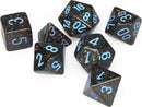 A set of six polyhedral dice in speckled blue stars design. The dice are primarily black with vibrant blue numbers and colorful speckles, perfect for tabletop gaming.