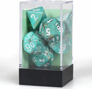 A set of polyhedral dice featuring a marble Oxi-Copper design with white numbering. The dice are displayed in a clear protective case, showcasing their vibrant turquoise and copper swirls, perfect for tabletop games.