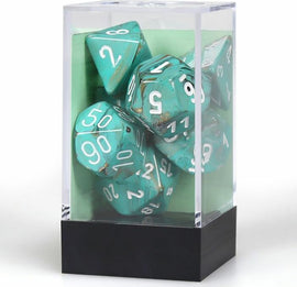 A set of polyhedral dice featuring a marble Oxi-Copper design with white numbering. The dice are displayed in a clear protective case, showcasing their vibrant turquoise and copper swirls, perfect for tabletop games.