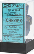 Teal and gold Phantom polyhedral dice set by Chessex. The set includes seven intricately designed dice, showcasing a vibrant teal color with striking gold numbers. Packaged in a clear box with a blue label, featuring warnings and information. Ideal for tabletop games and RPGs.