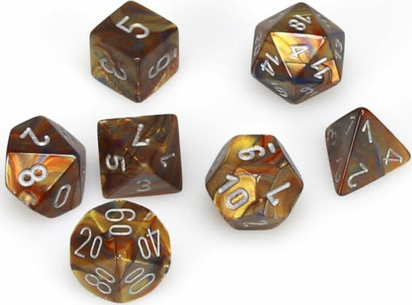 A shiny Lustrous Gold/Silver Polyhedral Dice Set by Chessex, consisting of seven uniquely shaped dice including d4, d6, d8, d10, d12, and d20, each showcasing marbled colors and clear numbering for easy visibility.
