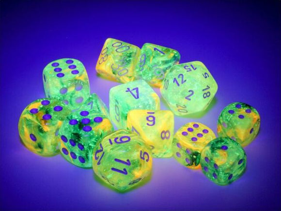 A vibrant assortment of translucent, glow-in-the-dark dice in shades of green and yellow, featuring purple numbers. The collection includes various polyhedral shapes suitable for tabletop games, highlighting their luminous qualities against a dark background.