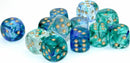 A collection of vibrant, translucent polyhedral dice in shades of blue and green, featuring golden pips. The assortment includes several D6 dice made by Chessex, ideal for tabletop games.