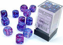 A collection of twelve blue and purple translucent dice from Chessex, featuring vibrant blue dots. The dice are scattered around their clear packaging, showcasing their unique swirling colors and design, ideal for tabletop gaming.