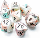 A lustrous 7-piece dice set by Chessex featuring a unique sea shell and black luminary design. The dice have numbers clearly marked in black and include various shapes such as d20, d12, d10, d8, d6, and d4, perfect for tabletop gaming.