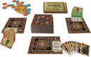 Ship Shape game by Calliope featuring various components. Includes resource tokens in blue and orange, multiple game cards, and player boards with a pirate theme. The game is designed for strategic play, encouraging players to navigate challenges and achieve goals.
