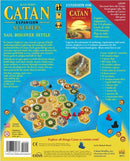 Catan: Seafarers game expansion box art showcasing colorful game pieces, a hexagonal game board layout, and information about gameplay and contents. The design features the title prominently at the top, along with an illustration of the adventurous seafaring theme.