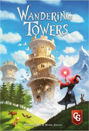 Wandering Towers game by Capstone. The cover features a whimsical illustration of tall, spiraling towers surrounded by lush greenery and magical elements, including a wizard casting a spell and animals grazing nearby. The vibrant blue sky and majestic mountains in the background enhance the enchanting fantasy theme of the game.