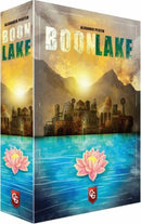 The Boonlake board game by Capstone Games features a beautifully illustrated box cover depicting a serene lake scene with a historic village and mountains in the background, adorned with vibrant lotus flowers in the foreground.