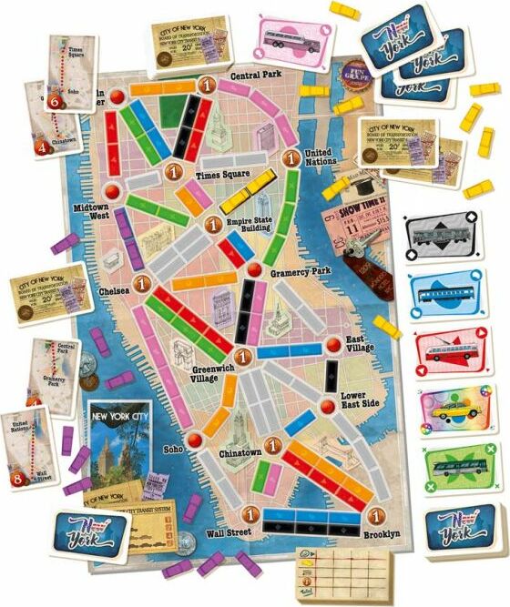 Ticket to Ride: New York board game featuring a colorful map of Manhattan with routes, playing pieces, and destination cards. The map highlights iconic locations such as Times Square, Central Park, and the Empire State Building, along with game components like trains and ticket cards in vibrant colors.