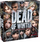 Dead of Winter: A Crossroads Game by Plaid Hat Games. The game box features a striking design with intense character portraits amidst a snowy backdrop. The title 'DEAD OF WINTER' is prominently displayed in bold, icy letters, suggesting a theme of survival and strategy in a post-apocalyptic setting.