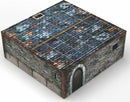 A detailed game box for 'Tenfold Dungeon: The Town' by Gale Force 9, showcasing a textured stone building with a slate roof. The box features a realistic design, including wooden door and stone wall elements, ideal for immersive gameplay.