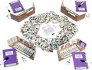 The Key Royal Star Casino board game by Haba, featuring a colorful array of game cards, player boards, and accessories spread out on a table. The setup includes different roles, character cards, and game pieces arranged in a circular formation, inviting strategic gameplay and interaction among players. The boxes are prominently displayed with a vibrant purple theme, enhancing its appeal for family game nights.