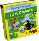 My First Orchard game box by HABA USA, featuring vibrant illustrations of apples, pears, and a playful crow. Suitable for children aged 2 and up, this engaging game promotes free play, color recognition, and shape understanding.