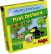 My First Orchard game by HABA USA, designed for young children aged 2 and up. The packaging features bright colors with illustrations of trees, fruits, and a friendly crow. This engaging game encourages cooperative play and basic color recognition.