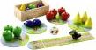 My First Orchard game by HABA USA featuring colorful wooden fruits, including red apples, green pears, and purple plums, along with a game board, dice, and a storage box, designed for young children to enjoy cooperative gameplay.