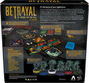 The back of the Betrayal at House on the Hill: 3rd Edition board game box showcasing the components and gameplay mechanics. The text describes the game atmosphere and how players navigate the haunted house. Features character cards, game pieces, and tiles used to move between rooms while investigating horror scenarios. Includes instructions and game setup details.