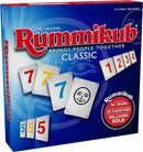 The original Rummikub game box featuring vibrant blue background with red accents. The box showcases colorful numbered tiles and a smiling joker tile, emphasizing the game's fun. Suitable for 2-4 players, ages 8 and up. 'Brings people together' tagline displayed prominently, highlighting its social aspect.