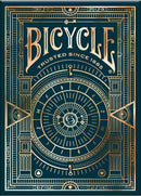 Bicycle Cypher Cards featuring a detailed, elegant design with gold and teal accents, showcasing intricate symbols and a circular motif in the center. Perfect for card games and magic tricks, these durable playing cards ensure hours of entertainment.
