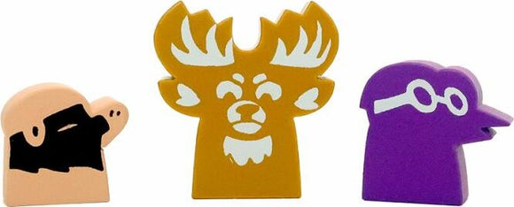 Three colorful game pieces from the Root: Underworld Hierlings Pack by Leder Games. The pieces include a character with a black beard, a moose-like figure with antlers, and a purple character wearing glasses. Each piece has a unique design and shape, ideal for enhancing gameplay.