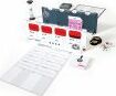 Decrypto game set by Iello, featuring colorful code cards, a timer, and various game components laid out. Perfect for team-based code breaking fun.