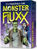 The box of the card game 'Monster Fluxx' by Looney Labs features colorful cartoon characters including a Frankenstein-like monster, a skeleton, and a vampire, all set against a purple background. The text on the box reads 'It's Frightfully Fun!' with bold green and yellow lettering.