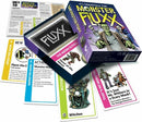 The Monster Fluxx game box by Looney Labs, featuring vibrant illustrations with a spooky theme. The box is partially open, revealing cards with unique monster-themed actions, goals, and rules, all showcasing whimsical art. There are visible cards like 'Witches' and 'Monster Mash' displayed around the box.
