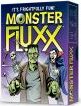 The box cover of the game "Monster Fluxx" by Looney Labs, featuring a humorous illustration of a green Frankenstein-like monster alongside other ghoulish characters. The title "Monster Fluxx" is prominently displayed at the top in bold, playful letters, with a tagline indicating it is "frightfully fun."