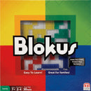 Blokus board game box featuring a colorful grid layout with yellow, green, blue, and red sections. The title 'Blokus' is prominently displayed in bold, playful lettering. The box states 'Easy To Learn!' and 'Great For Families!' along with details indicating suitable ages, number of players, and average playtime.