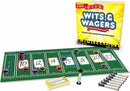 Wits & Wagers Deluxe Edition game set featuring a colorful box, game board with numbered betting spaces, chips for placing bets, an hourglass timer, and markers. Perfect for social gatherings and party entertainment.